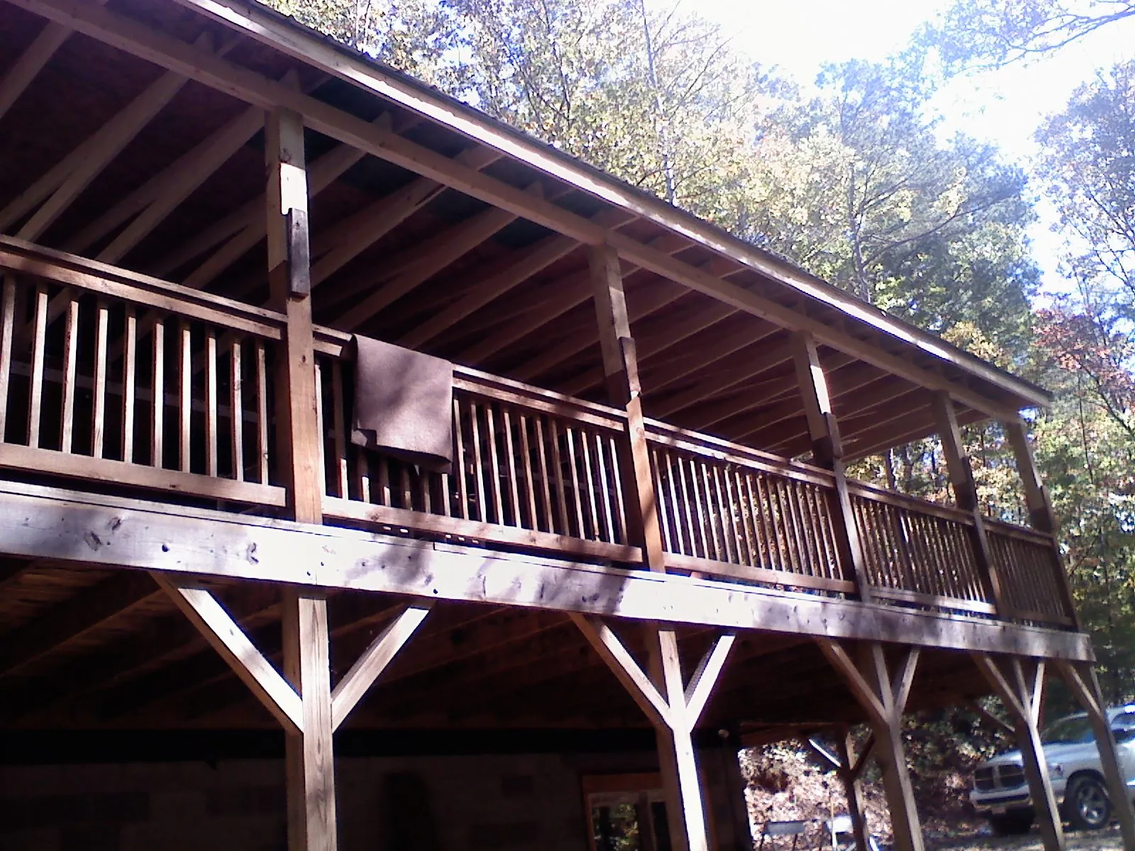 Timber framing under a new elevated porch and deck — Roof Leak Repair in New Caney by Roofing Brothers